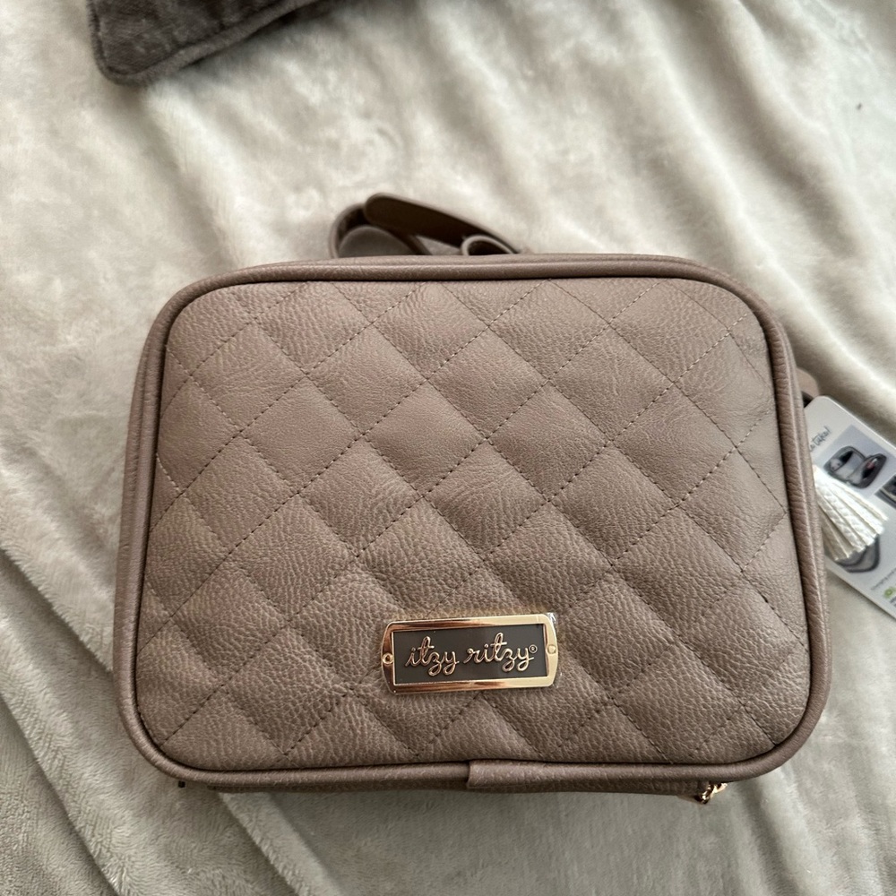 Itzy ritzy double take crossbody diaper bag